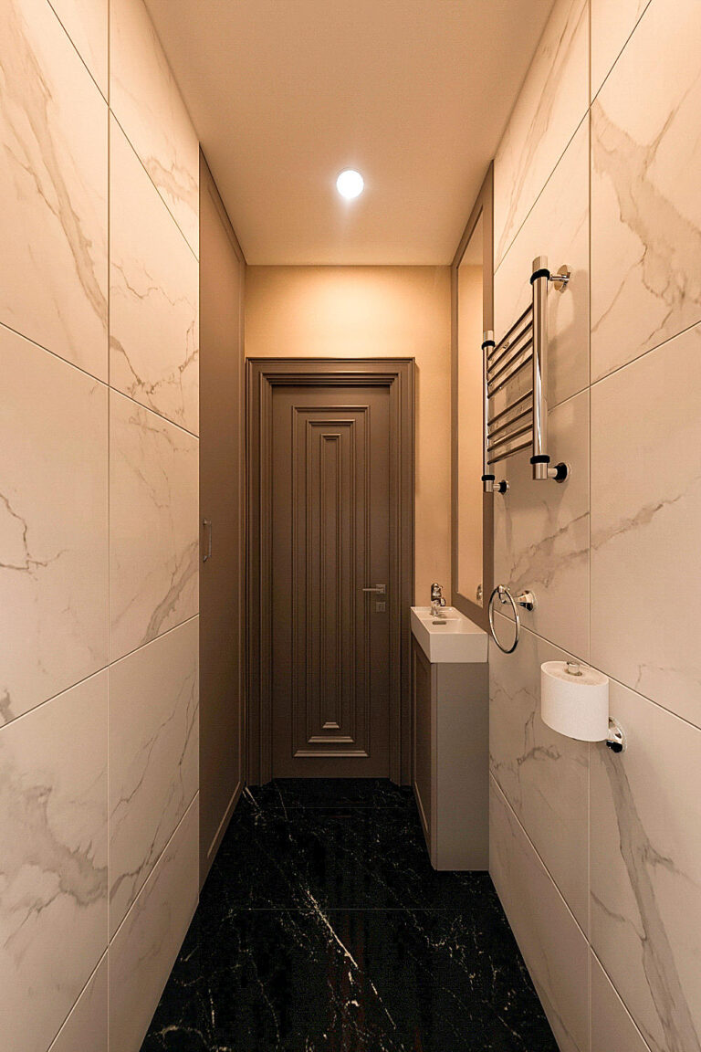 туалет в двухкомнатной квартире 55 кв. м., с маленьким умывальником возле двери, зеркалом в раме, шкафом в нише, полотенцесушитель сунержа классический, светлые стены керамогранит и темный пол, фото 1