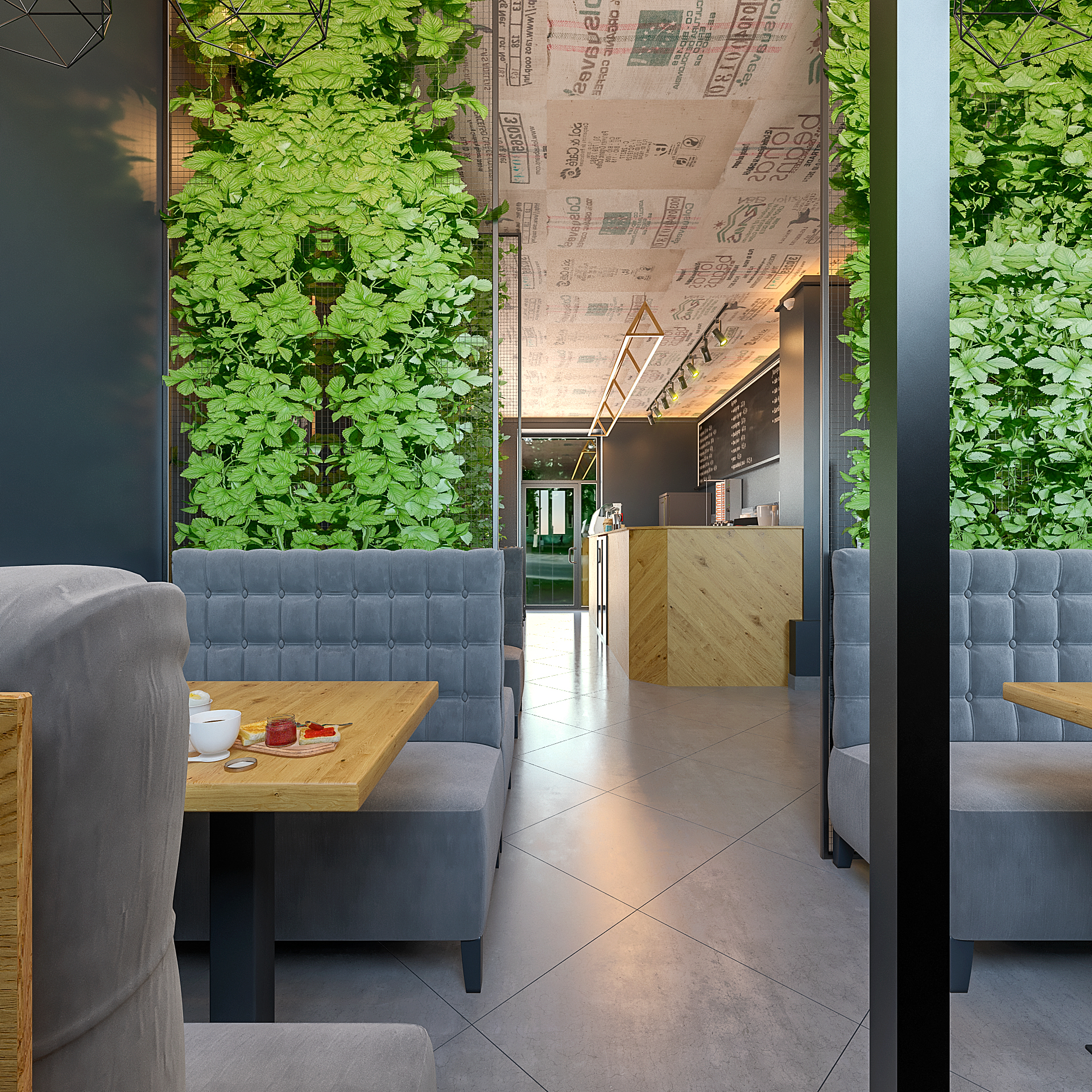 зонирование посадочных мест в кафе сетками на металлическом каркасе с декоративными растениями